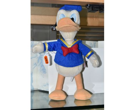 A BOXED STEIFF LIMITED EDITION 'DONALD DUCK', made from mohair and cotton, gold coloured button and white label no 354984, sw