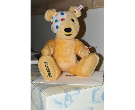 A BOXED STEIFF LIMITED EDITION CHILDREN IN NEED PUDSEY BEAR, no.654398, limited edition no.937/2009, yellow mohair, height 30
