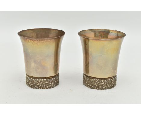 A PAIR OF ELIZABETH II SILVER BEAKERS, textured rims to the base, gilt exterior, hallmarked to the bases 'Deakin &amp; Franci