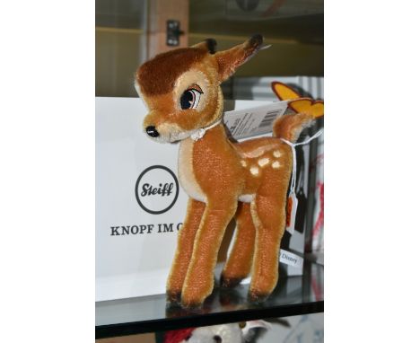 A BOXED STEIFF LIMITED EDITION 'DISNEY'S BAMBI', the character with light brown mohair and cotton covering, gold coloured ear