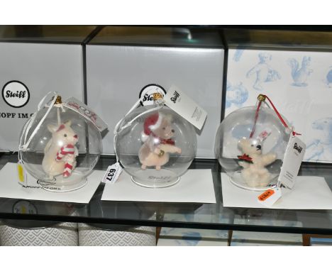 THREE BOXED LIMITED EDITION STEIFF CHRISTMAS ORNAMENTS, each in a glass sphere, to include Teddy Bear Ornament no 034855, lim