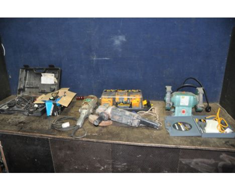 A TRAY CONTAINING POWER TOOLS including a Makita 6095D cordless drill with two batteries and charger, an Atlas Copco hammer d