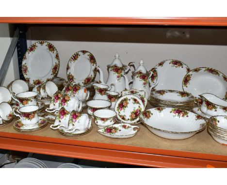 A LARGE QUANTITY OF ROYAL ALBERT 'OLD COUNTRY ROSES' PATTERN DINNERWARE, comprising  a circular serving dish and six dessert 