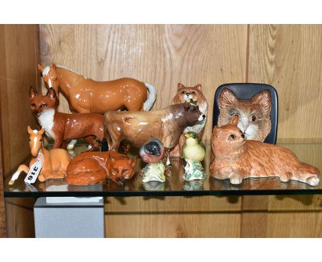 A GROUP OF BESWICK ANIMAL FIGURES, comprising a palomino Mare (Facing Left), model no 976 (small chip to underside of hoof), 