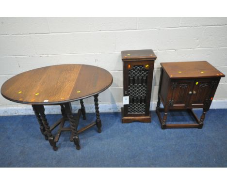 A 20TH CENTURY OAK BARLEY TWIST GATE LEG TABLE, open width 105cm x closed width 40cm x  depth 74cm x height 74cm, an old char