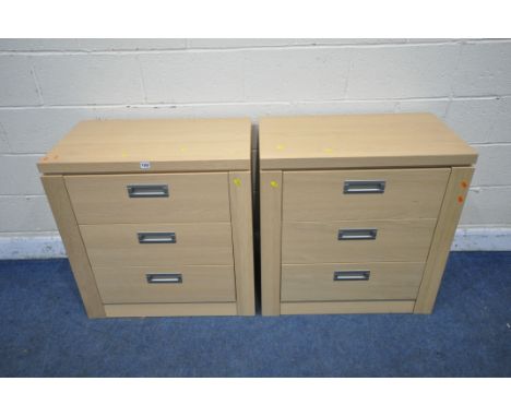 A PAIR OF HEAVY LIGHT OAK EFFECT CHEST OF THREE DRAWERS, width 76cm x depth 45cm x height 79cm (condition report: surface mar