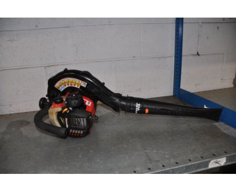 A HOMELITE HLB26BV PETROL LEAF BLOWER (engine starts and runs)