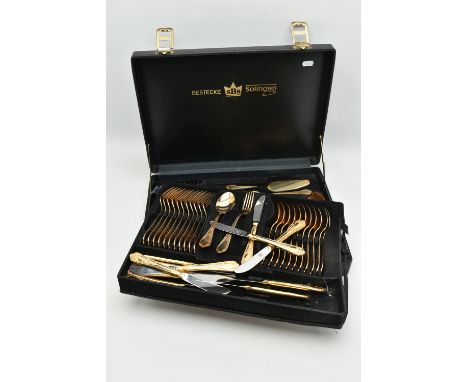 AN 'SBS BESTECKE SOLIGEN' BRIEFCASE CANTEEN, gold plated cutlery with stainless steel blades, complete twelve person table se