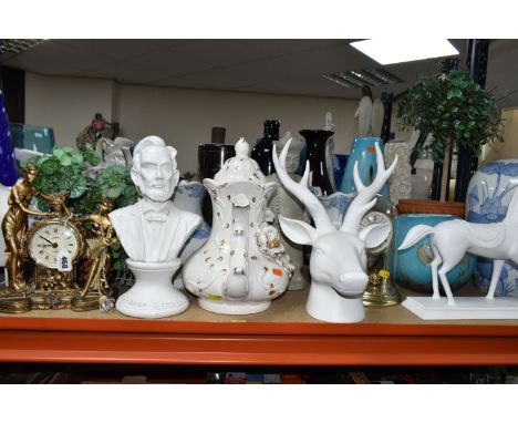 A LARGE QUANTITY OF VASES AND ORNAMENTS, comprising a gilt figural mantel clock, several Oriental style vases, a tall blue gl