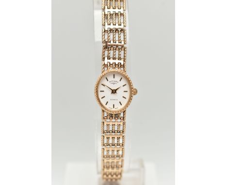 A LADIES 9CT GOLD 'ROTARY' WRISTWATCH, quartz movement, oval white dial signed 'Rotary', baton markers, gold tone hands, rope