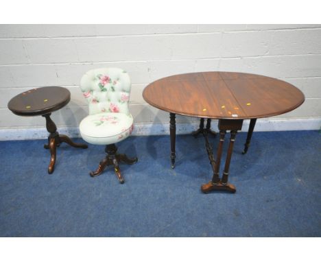 A 19TH CENTURY OVAL SUTHERLAND TABLE, raised on turned legs, shaped feet and brass castors, open width 121cm x closed width 1