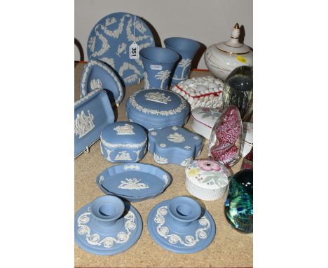 A COLLECTION OF WEDGWOOD BLUE JASPERWARE AND GLASS PAPERWEIGHTS, comprising a small cabinet plate, a pair of bud vases, three