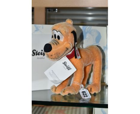 A BOXED STEIFF LIMITED EDITION 'PLUTO', with orange mohair and cotton, gold coloured ear button and white label no 354557, sw