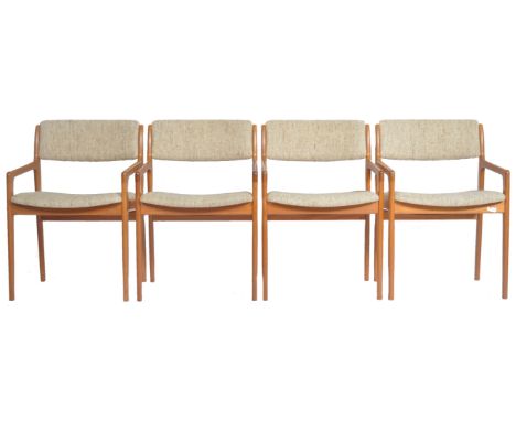 A set of 4 retro vintage Scandinavian dining chairs / armchairs. The chairs being of teak construction supporting a suspended