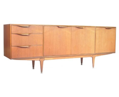 A.H. McIntosh Of Kirkcaldy - Dunvegan range - A 1960's retro vintage teak wood sideboard having the central twin door cupboar