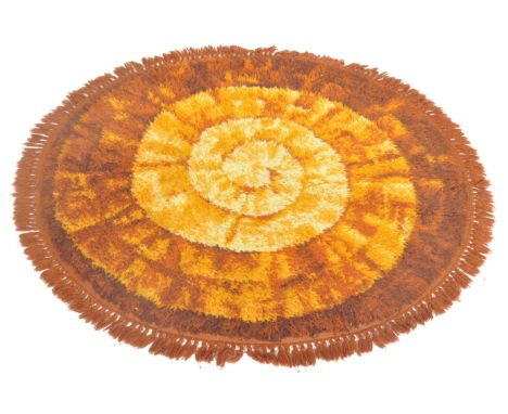 Rya&nbsp; - A mid 20th century retro vintage Nordic long shag pile circular rug in orange , yellow , brown and white dyes hav
