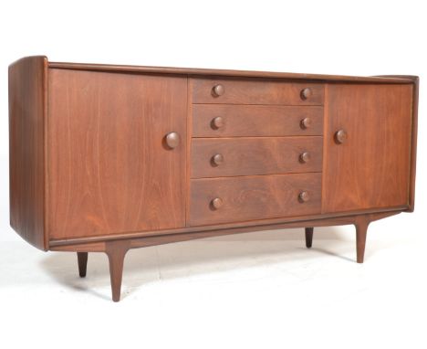 A. Younger LTD - A retro vintage 1960's stained solid teak wood sideboard credenza . The sideboard having a bank of four grad