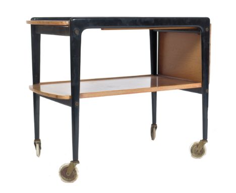 Yngve Ekstr&ouml;m - An original mid 20th century retro vintage two tier tea trolley having ebonised legs and raised on large