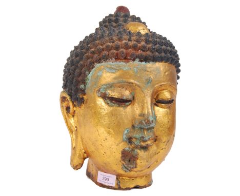 A 20th century large vintage Chinese / Tibetan style cast and gilded Gautama Buddha, also known as Siddhārtha Gautama, Shakya