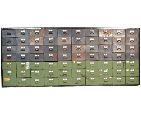 A 20th century vintage industrial 70 drawer metal filing cabinet locker from Australia. The cabinet having 40x drawers in bas