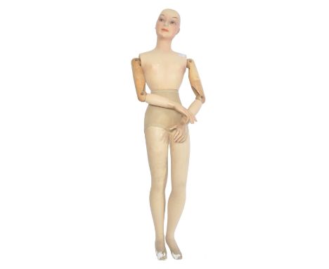 An original vintage early 20th century plaster shops / haberdashery display mannequin. The mannequin being of short proportio