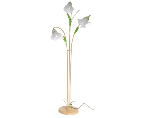 A 20th century Italian painted floral shaped wire and metal work floor standing standard lamp. The lamp bearing lily flower a