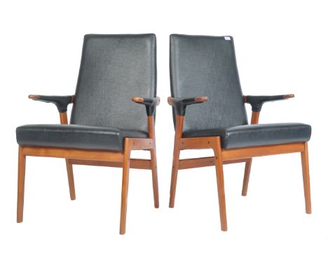 A superb pair of Scandinavian retro vintage teak wood carver / high back chairs / armchairs. The chair having unusual shaped 