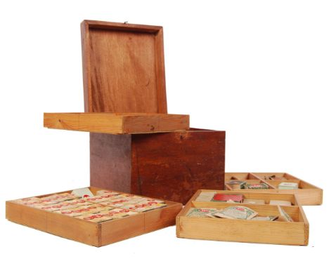 A retro vintage collection of shop advertising priced gummed tickets each in their original boxes or sachets all kept within 