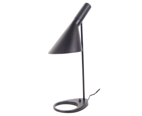 After Arne Jacobsen - A contemporary table / desk lamp. The lamp having an adjustable conical shaped shade on a straight supp