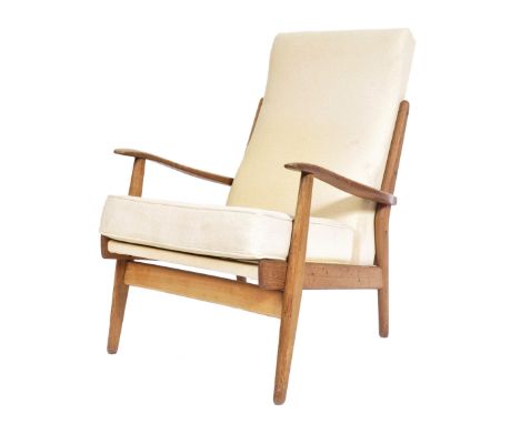 A stunning retro vintage 20th century Scandinavian teak wood lounge chair / armchair having shaped armrests and a tall back r