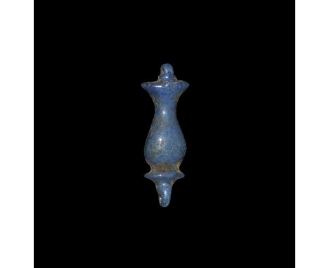 New Kingdom, Amarna Period, 1353-1336 BC. A blue glazed composition amulet of a papyrus plant with suspension loop to top and