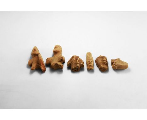 1st millennium BC. A mixed group of ceramic heads and figure fragments.  271 grams total, 47-78mm (1 3/4 - 3"). Property of a