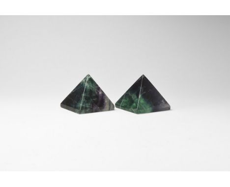 A group of two banded purple fluorite pyramids, in white card tray. See Bonewitz, Dr. Ronald Louis, Rocks & Minerals, 2008, p