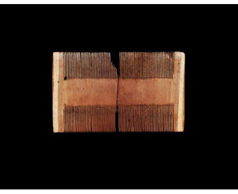 Wrecked 1735. A rectangular bone comb with fine teeth to both long edges. Accompanied by a certificate of authenticity issued