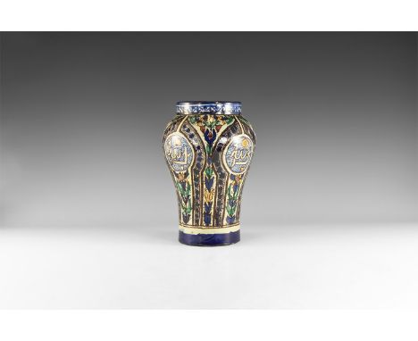 Late 19th - early 20th century AD. A ceramic vase with cobalt blue border to the neck with arrow patter; body with floral pat