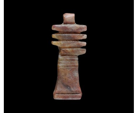 Late Period, 664-332 BC. A carved hardstone amuletic pendant of the djed pillar with dorsal bar, pierced.  0.59 grams, 19mm (