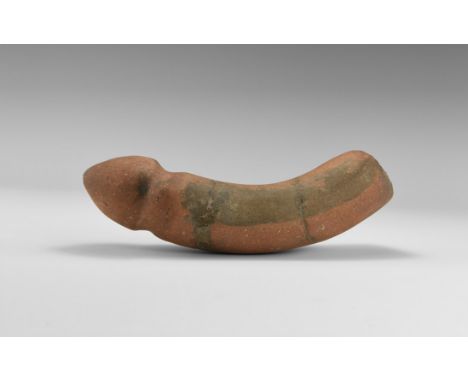 An undated archaistic very large ceramic phallus with curving shaft.  725 grams, 21.5cm (8 1/2"). From an old German collecti