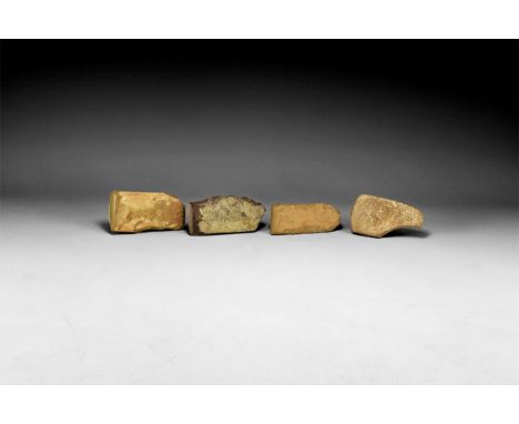 Neolithic Period, 5th-2nd millennium BC. A mixed group of stone tools comprising: a tongue-shaped blade with chamfered edge; 