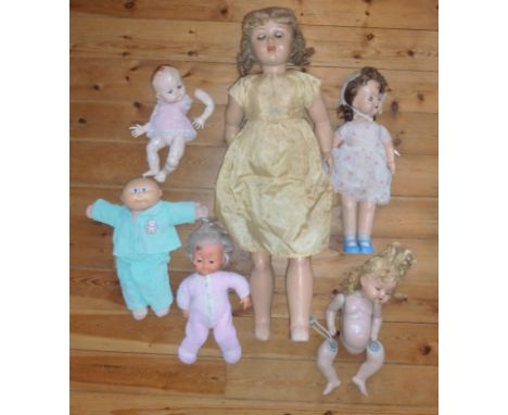 A GROUP OF SIX DOLLS INCLUDING A CABBAGE PATCH KIDS DOLL 1983 ORIGINAL APPALACHAN ARTWORKS INC.