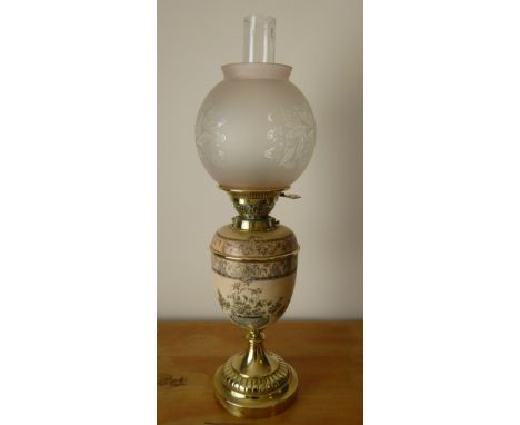 BRASS OIL LAMP WITH BLUSH IVORY CERAMIC RESERVOIR AND CLASSICAL TRANSFER PRINTED FOLIATE DESIGN (h: 60 cm)