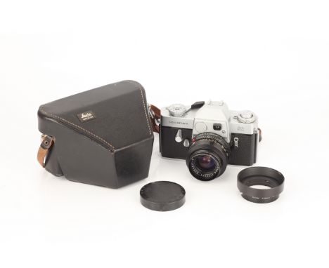 A Leica Leicaflex SLR Camera, chrome, with Leitz Elmarit-R f/2.8 35mm lens, with lens hood in maker's case