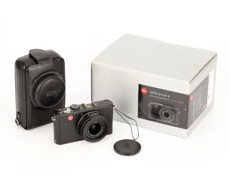 A Leica D-Lux 4 Compact Digital Camera, with additional grip, complete with case and box (a lot)