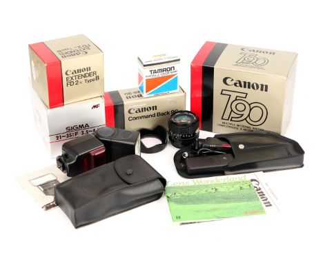 A Canon T90 SLR Camera, with FD f/2.8 24mm and Sigma MF f/3.5-4.2 21-35mm lenses, complete with Command Back 90, flash unit a