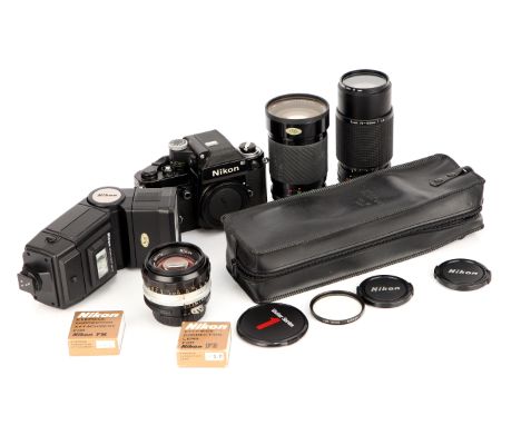 A Nikon F2 Photomic SLR Camera, black, with Nikkor-S.C. f/1.4 50mm lens, together with two telephoto lenses and accessories (