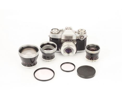 A Zeiss Ikon Contaflex Camera, together with Carl Zeiss Pro-Tessar f/4 85mm, Pro-Tessar f/3.2 35mm and Pro-Tessar f/4 115mm l