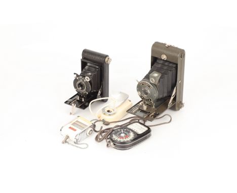 A Kodak Vest Pocket Kodak Model B Folding Camera, together with an Ensign Greyhound, complete with two light meters (a lot)
