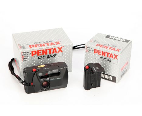 A Pentax PC35 AF Compact Camera, with PC35 winder, both in maker's boxes