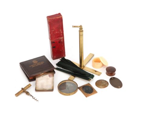 A Collector's Lot, including a microscope shade in a red moroccan leather case (silk split), a corkscrew in a brass case, a t