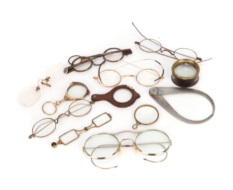 A Victorian Lorgnette, with a further eight pairs of spectacles, magnifying glasses and a caliper (12)