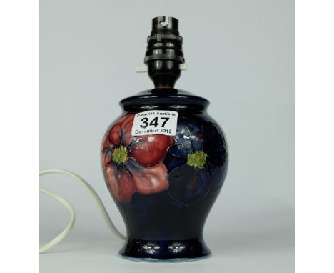 Moorcroft lamp base decorated in the Clematis design, overall height 24cm